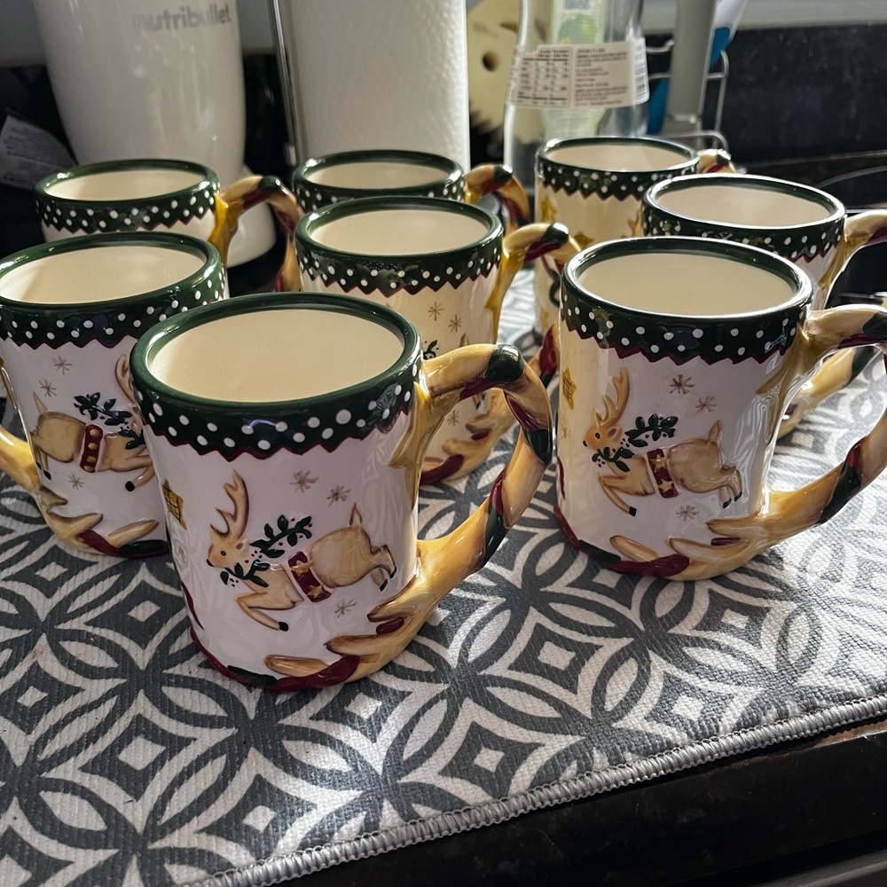 MWW Market set of 8 holiday reindeer mugs. No chips or cracks.